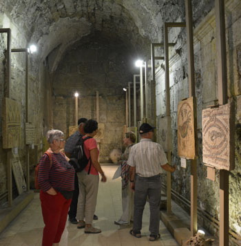 In this recent photo, tourists visit a museum at the Roman Theatre in downtown Amman (Photo by Amjad Ghsoun)